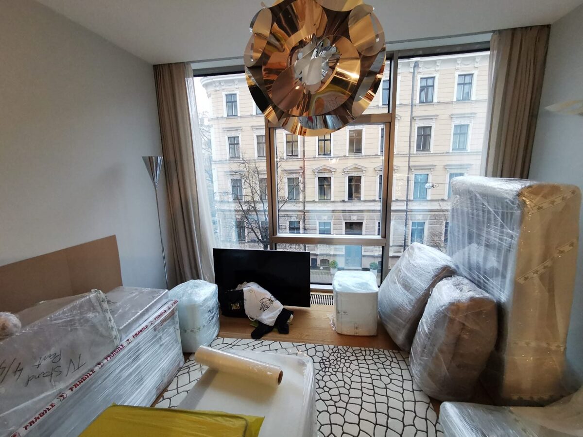 Moving service in Riga — FF International Movers professionally wrapped and packed furniture in a Riga city-centre apartment